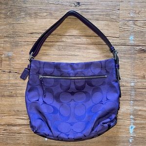 Purple Coach purse with adjustable strap